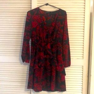 Red roses on black.